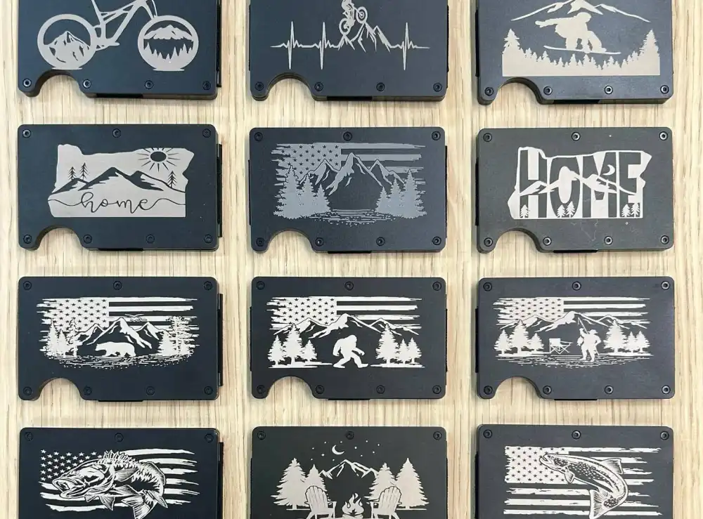 metal wallets laser engraved on wood display