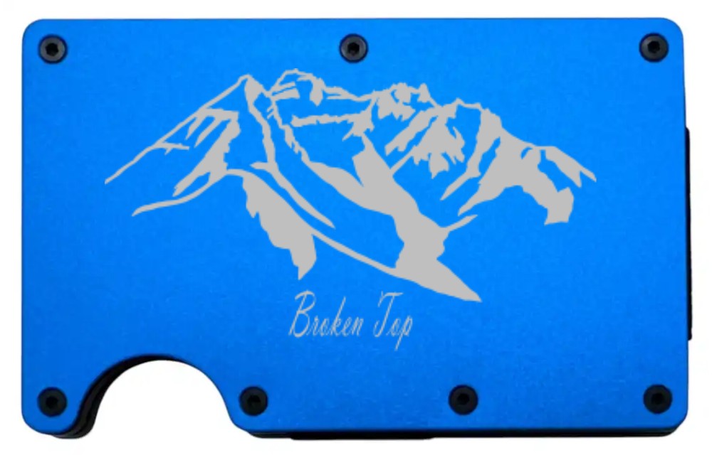 Broken Top Mountain design laser engraved on a blue metal wallet (preview)