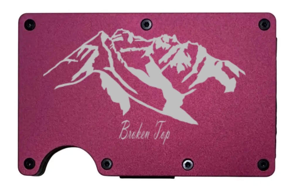 Broken Top Mountain design laser engraved on a wine red metal wallet (preview)