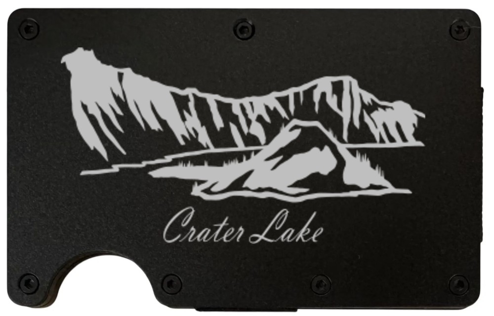 Crater Lake laser engraved on a black metal wallet