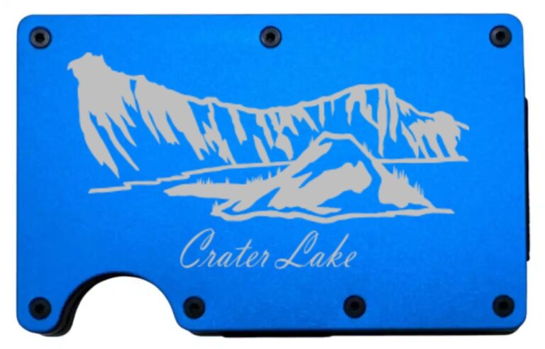 Crater Lake laser engraved on a blue metal wallet