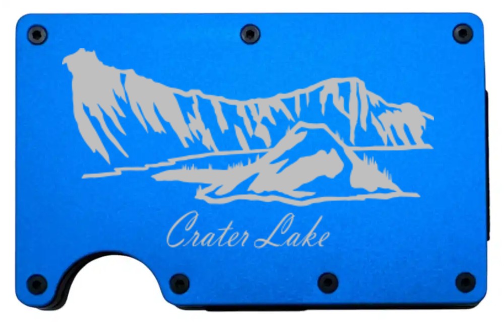 Crater Lake laser engraved on a blue metal wallet