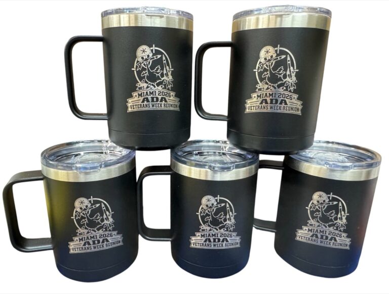 Five black handled mugs laser engraved with the Miami 2026 ADA Veterans Week Reunion logo