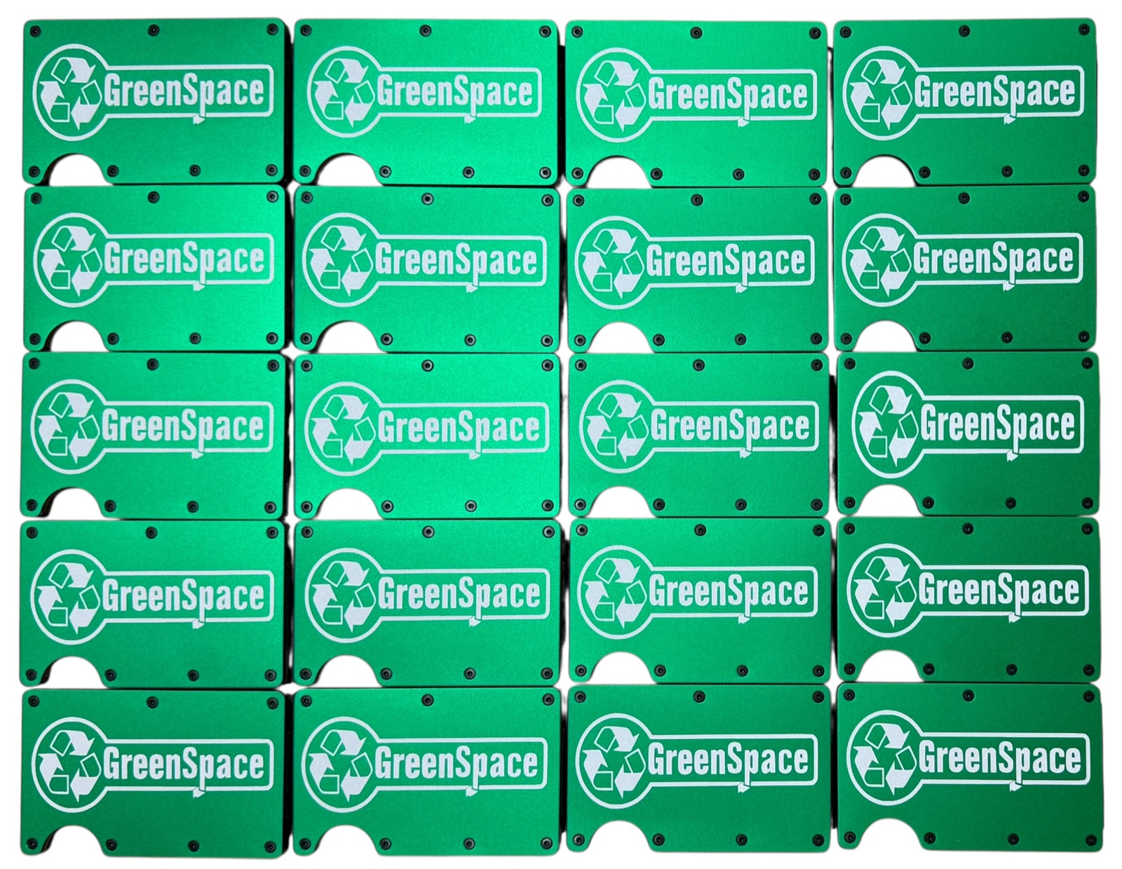 GreenSpace logo laser engraved on a set of bright green metal wallets