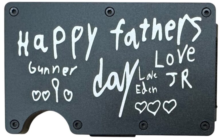 Children's handwritten Happy Father's Day note laser engraved on a black metal wallet