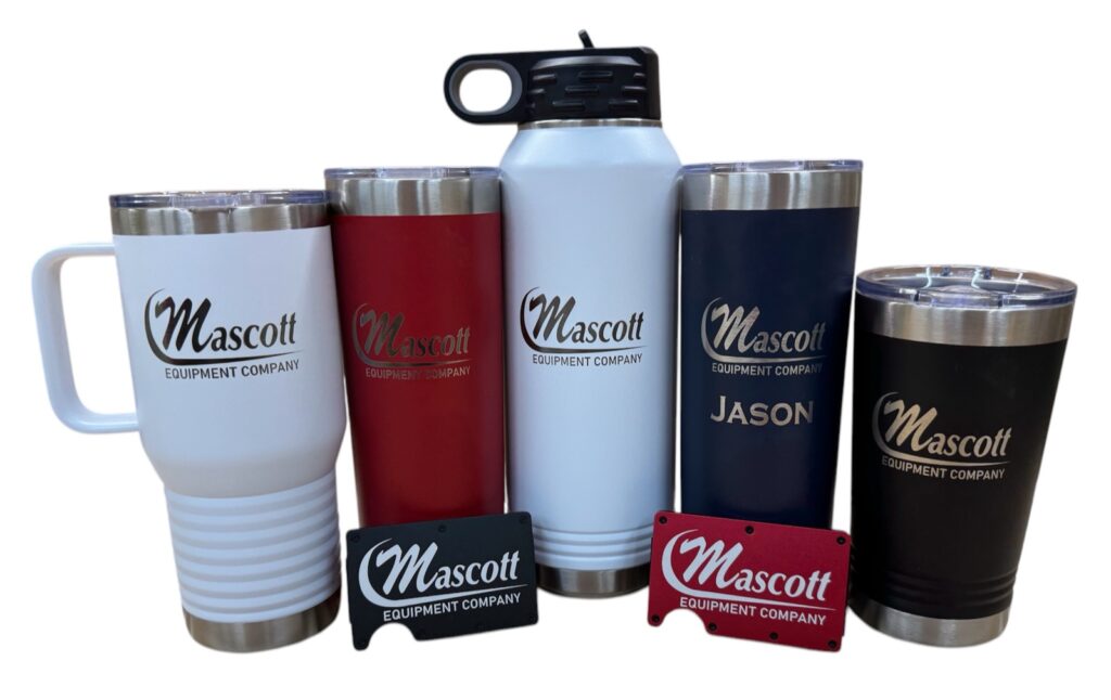 Mascott Equipment Company logo laser engraved on tumblers, a water bottle, a mug and metal wallets