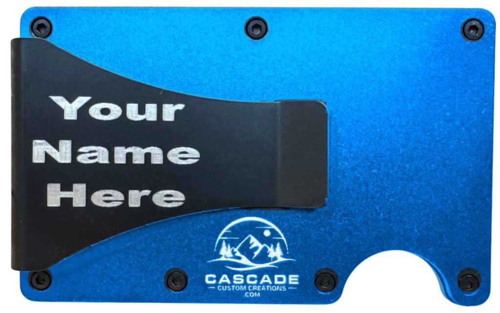 Back of a blue metal wallet showing a name laser engraved on the cash clip