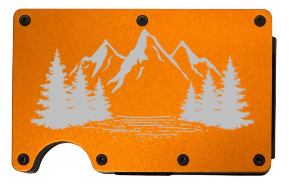 Mountains, Lake, and Forest design laser engraved on a orange metal wallet (preview)