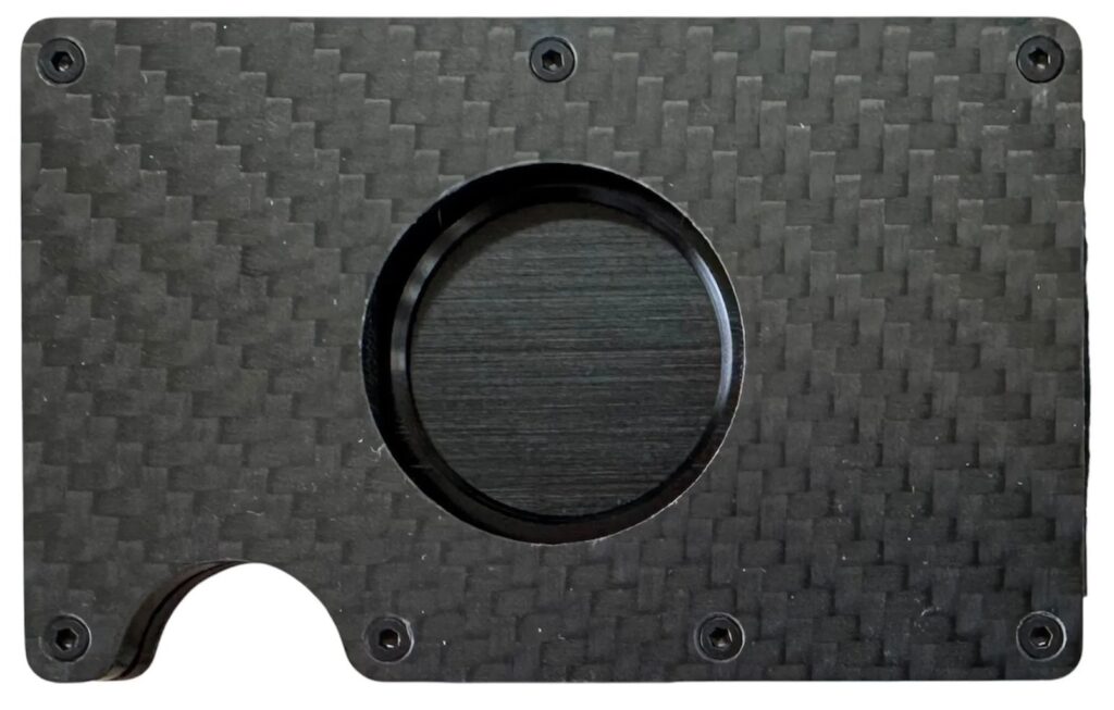 Front of the Apple AirTag Wallet in carbon fiber, with the round AirTag window