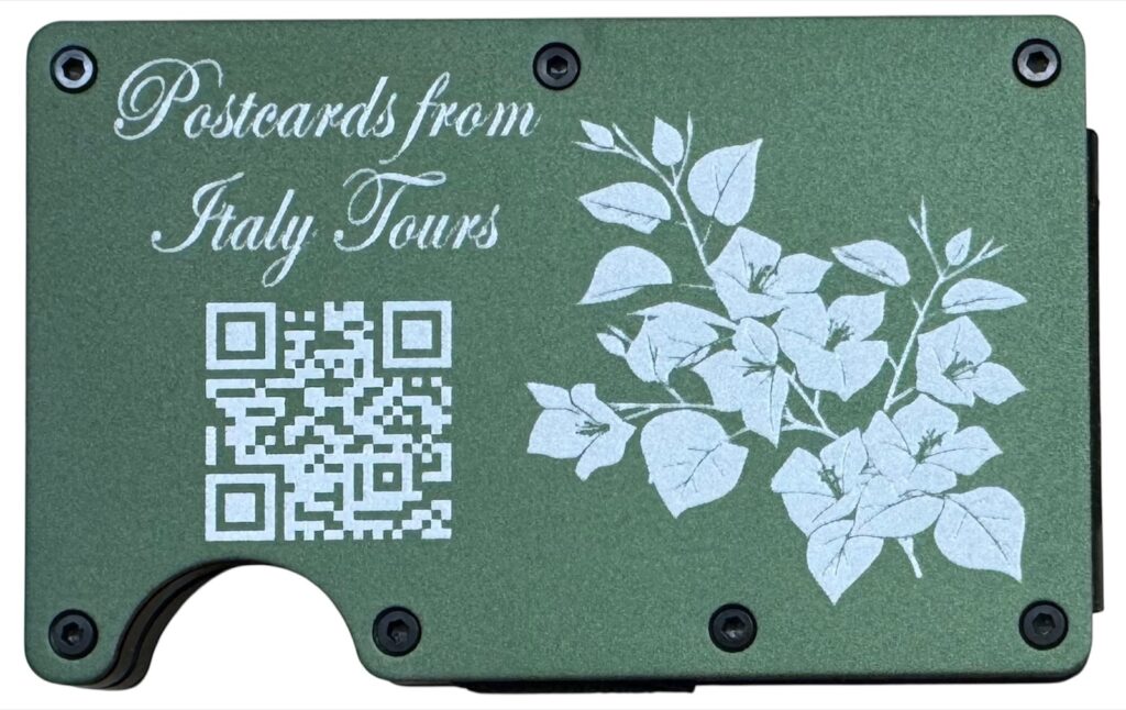 Postcards from Italy Tours name, flowers and QR code laser engraved on an army green metal wallet