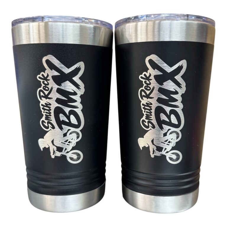 Smith Rock BMX logo with a BMX rider laser engraved on two black tumblers