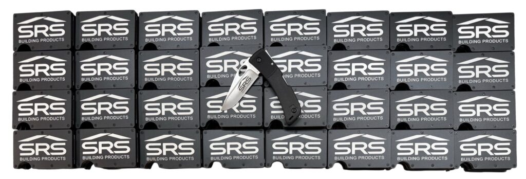SRS Building Products logo laser engraved on a large set of black metal wallets