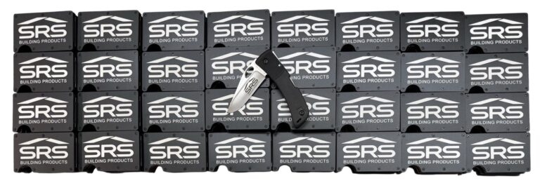 SRS Building Products logo laser engraved on a large set of black metal wallets